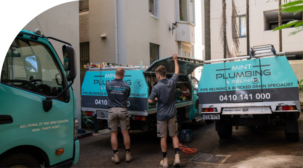 Members of the Mint Plumbing team preparing for a job