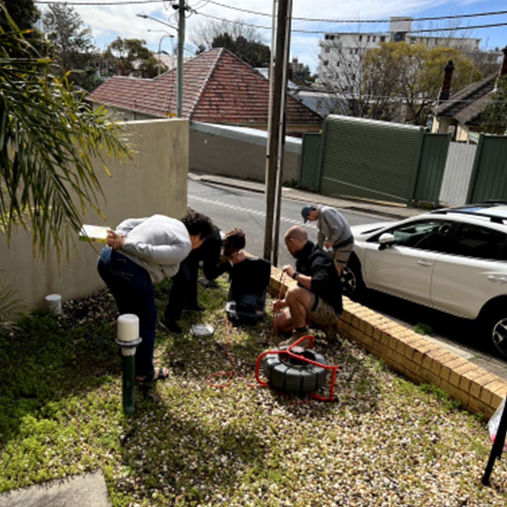 Our bondi plumbers clearing a blocked drain