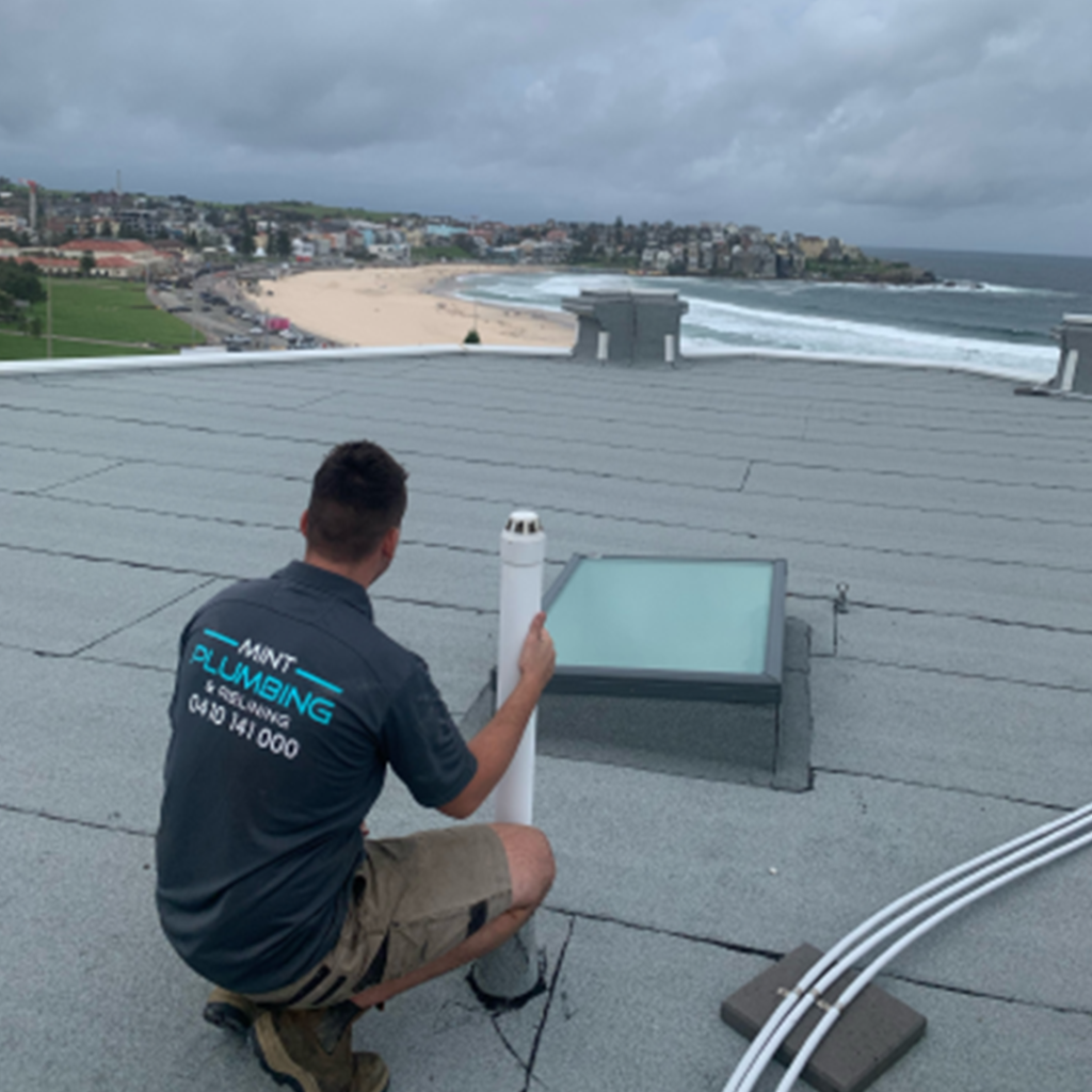 A expert plumber completing roof plumbing